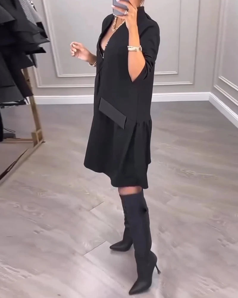 COLLEEN | ZIP-FRONT V-HALS SWING DRESS MET RUFFLE HEM