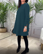 MEREDITH | RONDE HALS CUT-OUT MOUW SWING DRESS