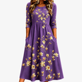 EVELYN | Gouden Magnolia Charm Pocket Midi Jurk