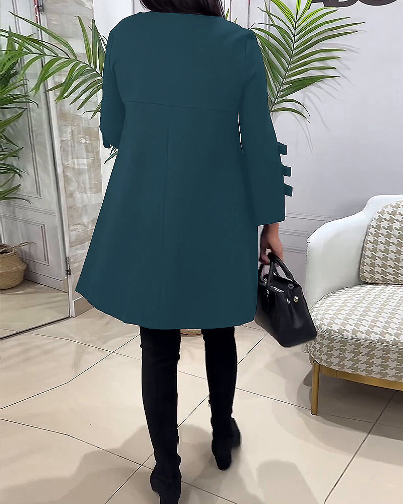 MEREDITH | RONDE HALS CUT-OUT MOUW SWING DRESS