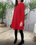 MEREDITH | RONDE HALS CUT-OUT MOUW SWING DRESS