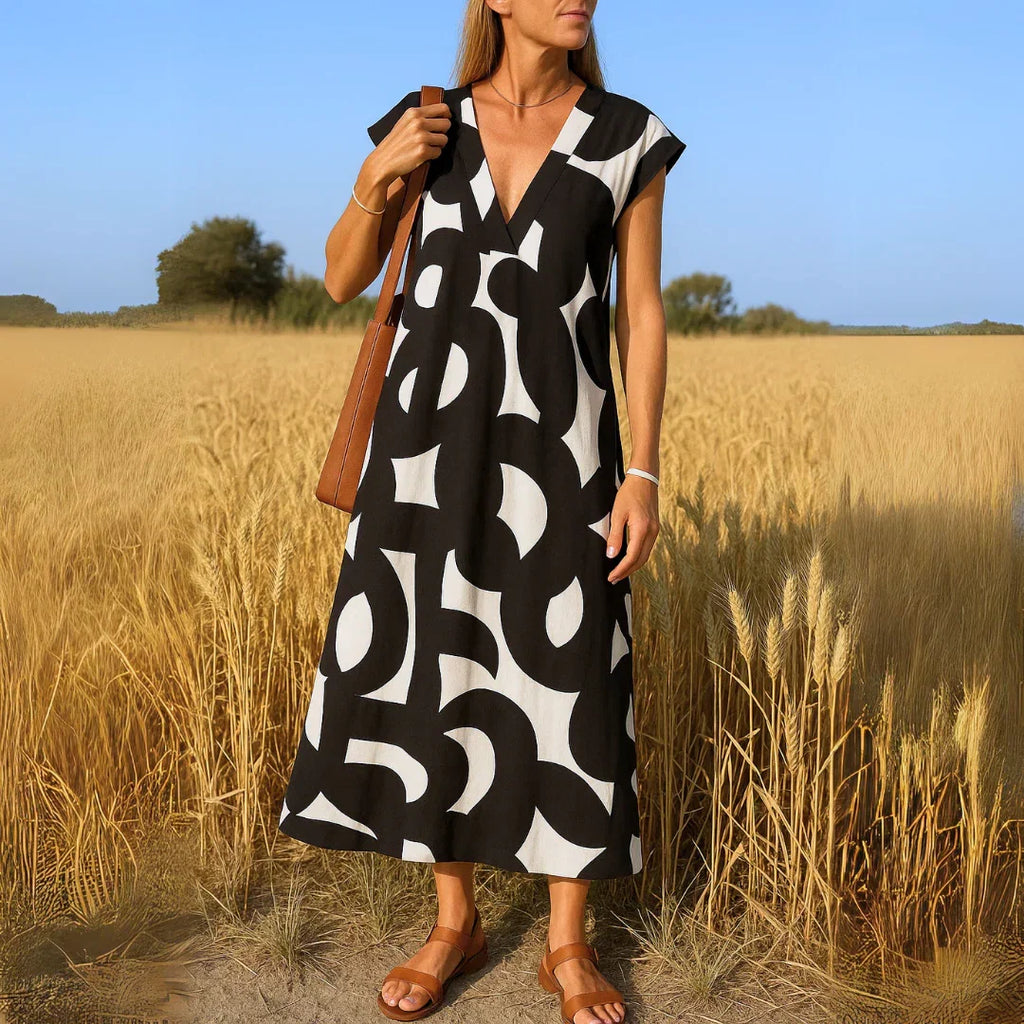 TATIANA | MAXI JURK MET CUTWORK DETAILS