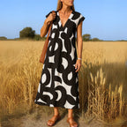 TATIANA | MAXI JURK MET CUTWORK DETAILS