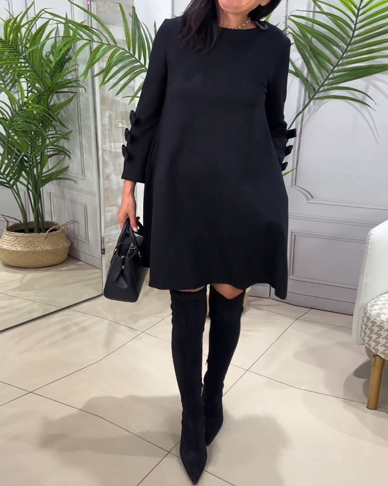 MEREDITH | RONDE HALS CUT-OUT MOUW SWING DRESS