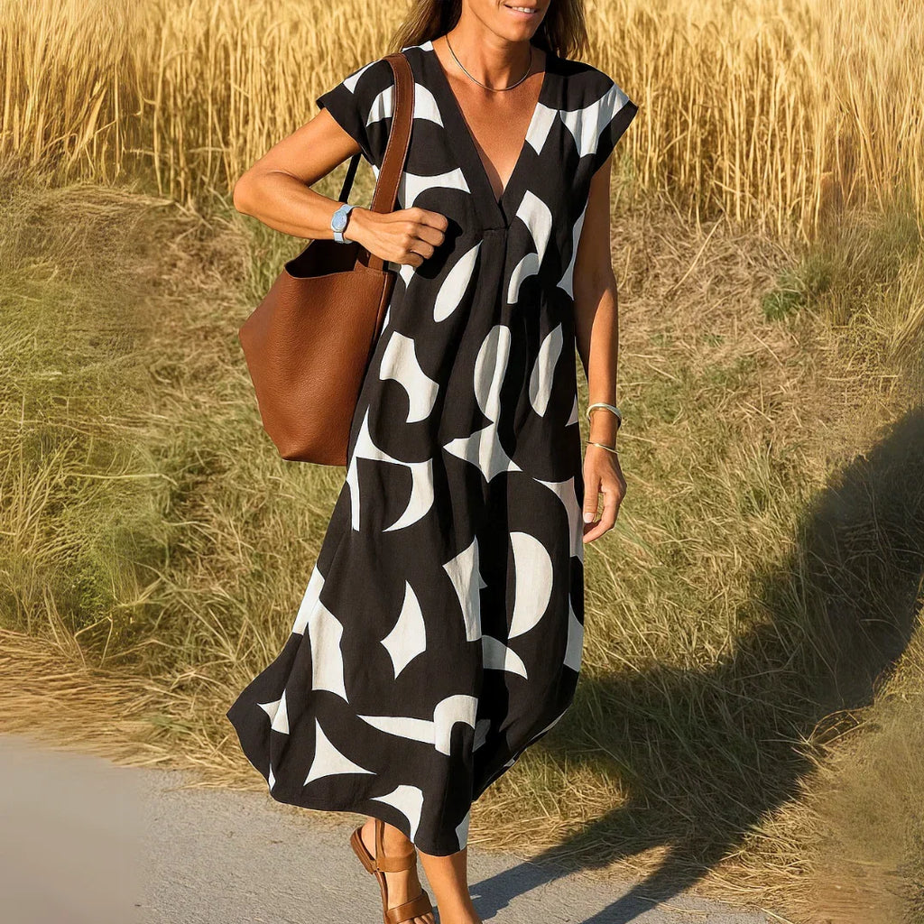 TATIANA | MAXI JURK MET CUTWORK DETAILS