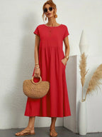 MAXINE | VLOEIENDE ELEGANTE TIMELOZE MIDI JURK