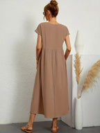 MAXINE | VLOEIENDE ELEGANTE TIMELOZE MIDI JURK