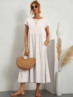 MAXINE | VLOEIENDE ELEGANTE TIMELOZE MIDI JURK