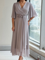 MARGUERITE | ELEGANTE LANGE V-HALS CHIFFON JURK