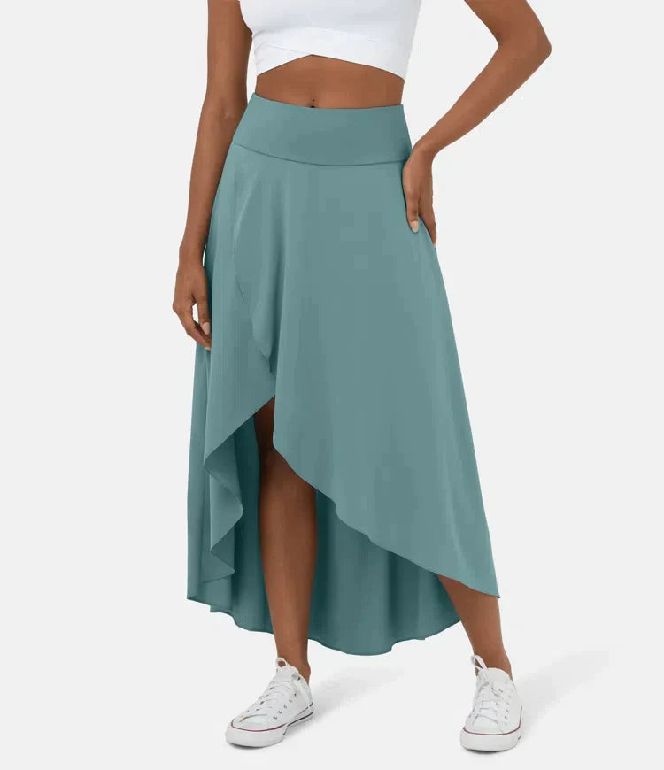BERYL | SNEL DROGEND HOGE TAILE MIDI ROK MET RUFFLE RAND