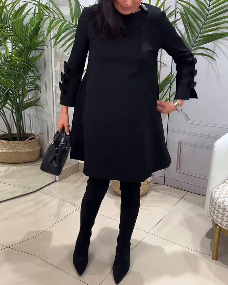 MEREDITH | RONDE HALS CUT-OUT MOUW SWING DRESS
