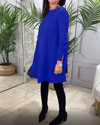 MEREDITH | RONDE HALS CUT-OUT MOUW SWING DRESS