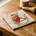 Vera's Sphere Oranje Koper Armband