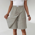HEATHER | ELASTISCHE ACTIEVE SHORTS MET ZAKKEN
