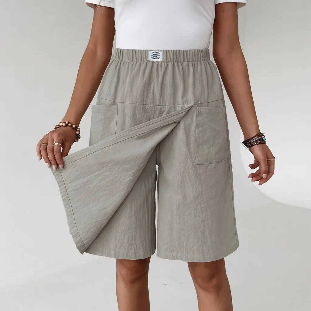 HEATHER | ELASTISCHE ACTIEVE SHORTS MET ZAKKEN